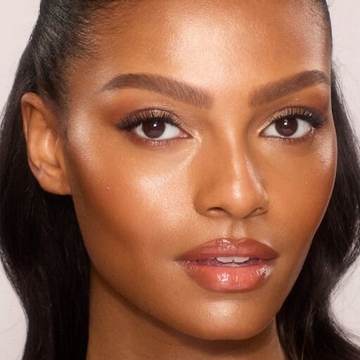 UNREAL SKIN SHEER GLOW TINT HYDRATERENDE FOUNDATIONSTICK 12 TAN