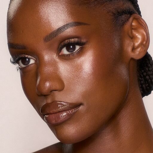 UNREAL SKIN SHEER GLOW TINT HYDRATERENDE FOUNDATIONSTICK 14 DEEP