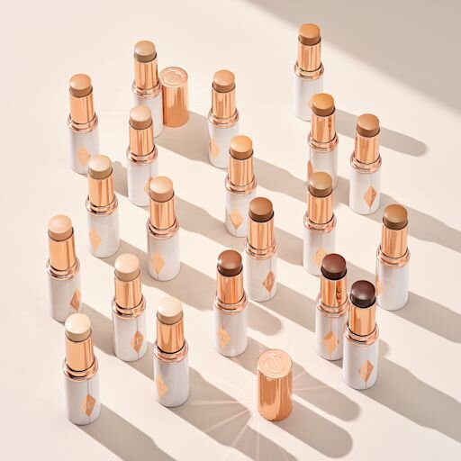 UNREAL SKIN SHEER GLOW TINT HYDRATERENDE FOUNDATIONSTICK 13 DEEP