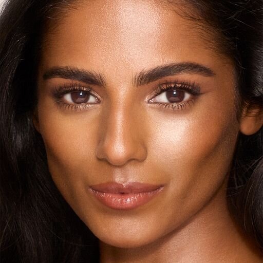 UNREAL SKIN SHEER GLOW TINT HYDRATERENDE FOUNDATIONSTICK 9 TAN